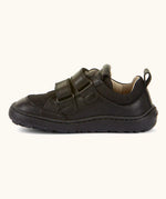 Side of Froddo barefoot low profile children's shoe in black showing 2 velcro fasteners looped through eyelets