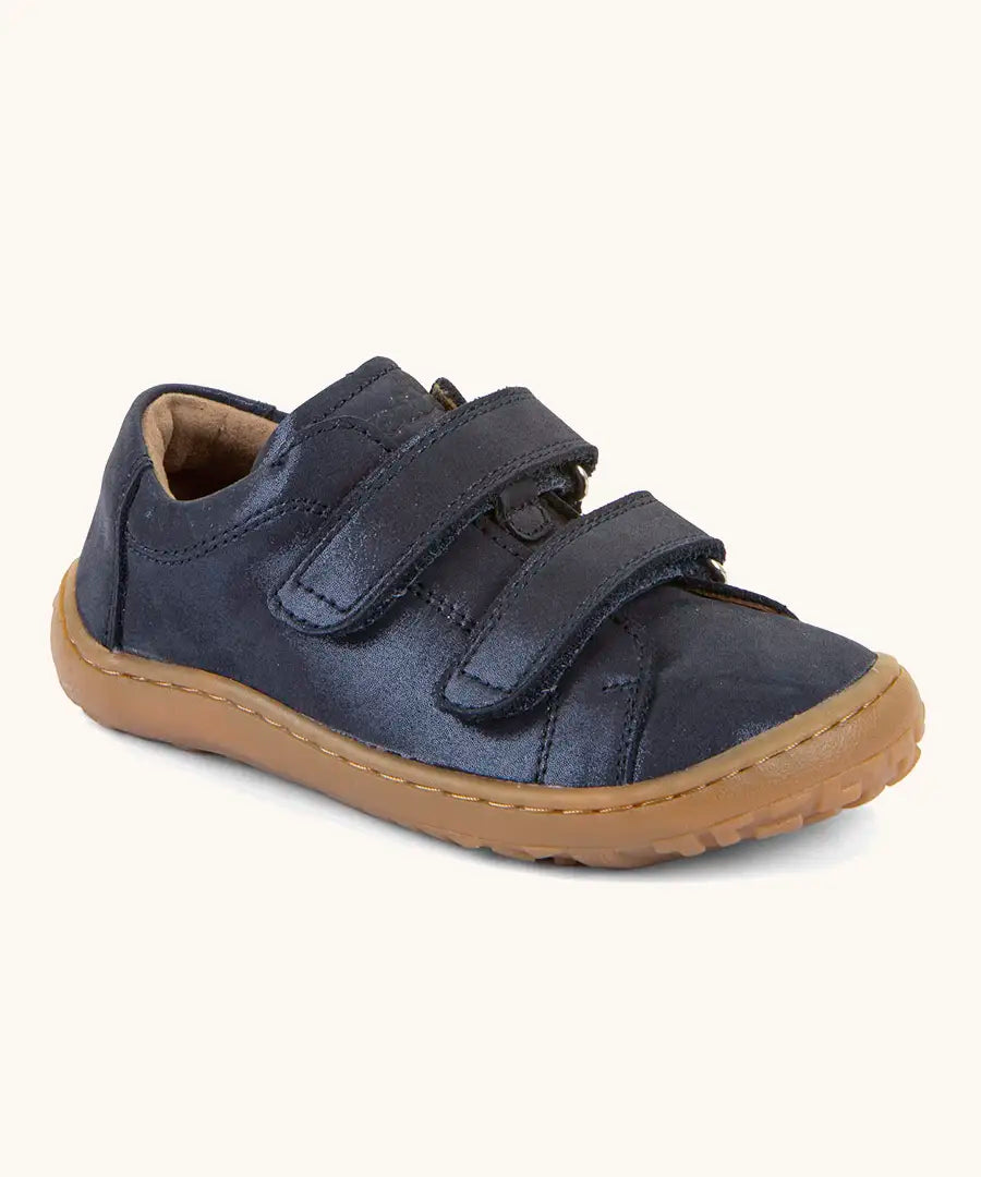 Froddo natural leather barefoot base children's shoe in blue, showing 2 velcro fasteners and a grippy sole. Shoe has a low profile