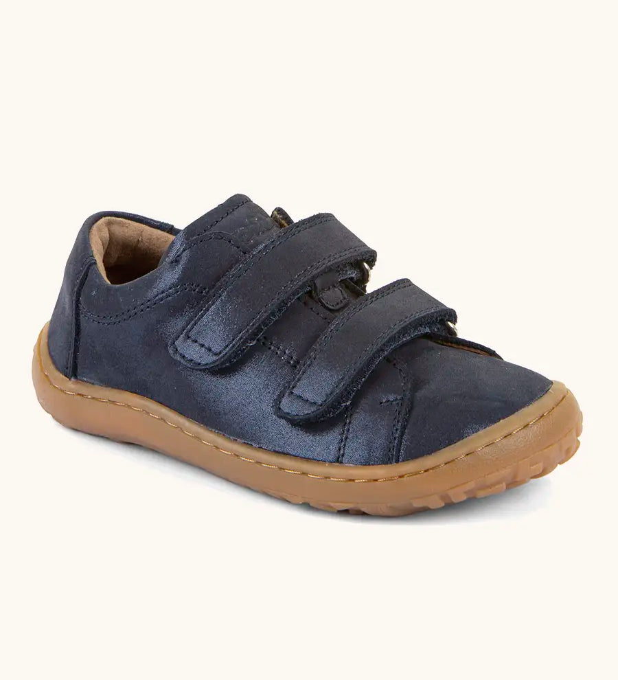 Froddo natural leather barefoot base children's shoe in blue, showing 2 velcro fasteners and a grippy sole. Shoe has a low profile