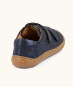 Back of the Froddo barefoot base children's shoe in blue showing the padded ankle support and brown grippy sole
