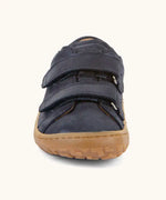 Front of the Froddo barefoot base children's shoe in blue showing the 2 velcro fasteners and the brown grippy sole detail
