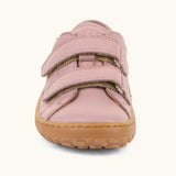 Front of the Froddo barefoot base children's shoe in pink showing the 2 velcro fasteners and the brown grippy sole detail