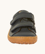 The front of the Froddo barefoot base children's shoe in navy available at Babipur. showing the 2 velcro fasteners and the brown grippy sole detail