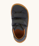 A top down image Froddo barefoot base children's shoe in navy available at Babipur. showing the velcro strap fastener and insole detail