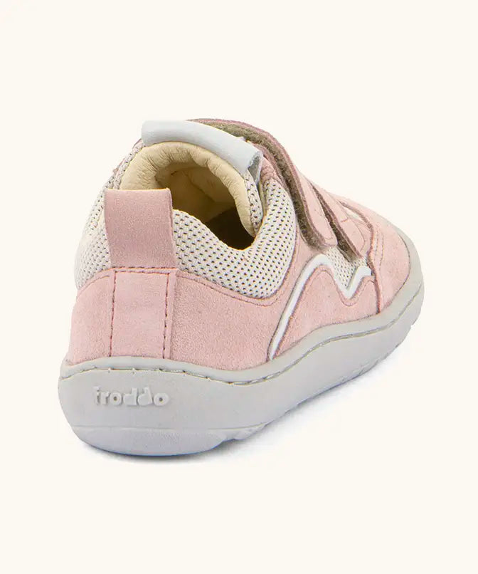 Froddo barefoot base children's shoe in pale pink. A trainer showing a pull tab on the back and padded ankle support
