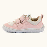 Side of Froddo barefoot base children's shoe in pale pink showing the 2 velcro fasteners looped through the eyelets