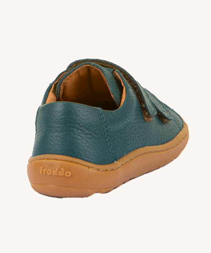 The back of the Froddo barefoot base children's shoe in petroleum available at Babipur. showing the padded ankle support and the brown grippy sole detail