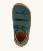 A top down image Froddo barefoot base children's shoe in petroleum available at Babipur. showing the velcro strap fastener and insole detail