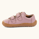 Side of Froddo barefoot base children's shoe in pink showing the 2 velcro fasteners looped through