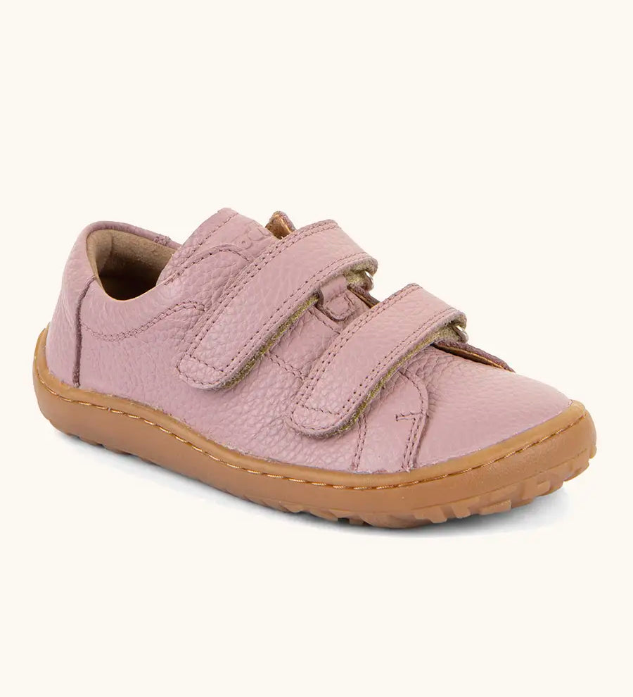 Froddo barefoot base children's shoe in pink. A natural leather low profile shoe showing 2 velcro fasteners and a grippy sole