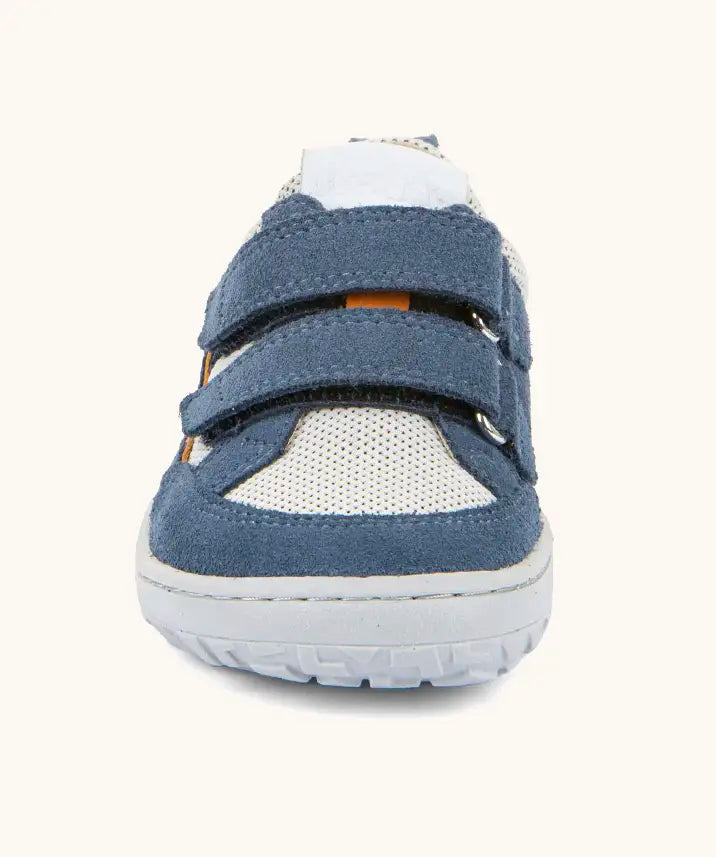 Front of the Froddo barefoot base children's shoe in blue and white showing the 2 blue velcro fasteners and a grey grippy sole