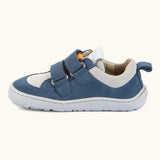 Side of Froddo barefoot low profile children's shoe in blue and white showing 2 blue velcro fasteners looped through eyelets
