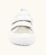 Front of the Froddo barefoot base children's shoe in white showing the 2 velcro fasteners and a white grippy sole