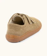Back of Froddo barefoot botaniq kids canvas stye shoes in beige with a brown rubber grippy sole 