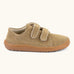 Side of Froddo barefoot botaniq kids canvas stye shoes in beige shows velcro straps a brown grippy sole