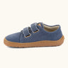 Froddo barefoot botaniq kids canvas stye shoes in blue shows velcro straps looped through the eyelets and a brown grippy sole