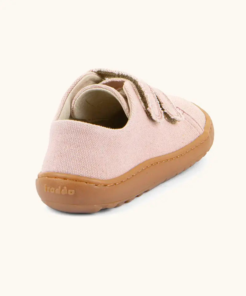 Back of Froddo barefoot botaniq kids canvas stye shoes in pale pink with a brown rubber grippy sole 