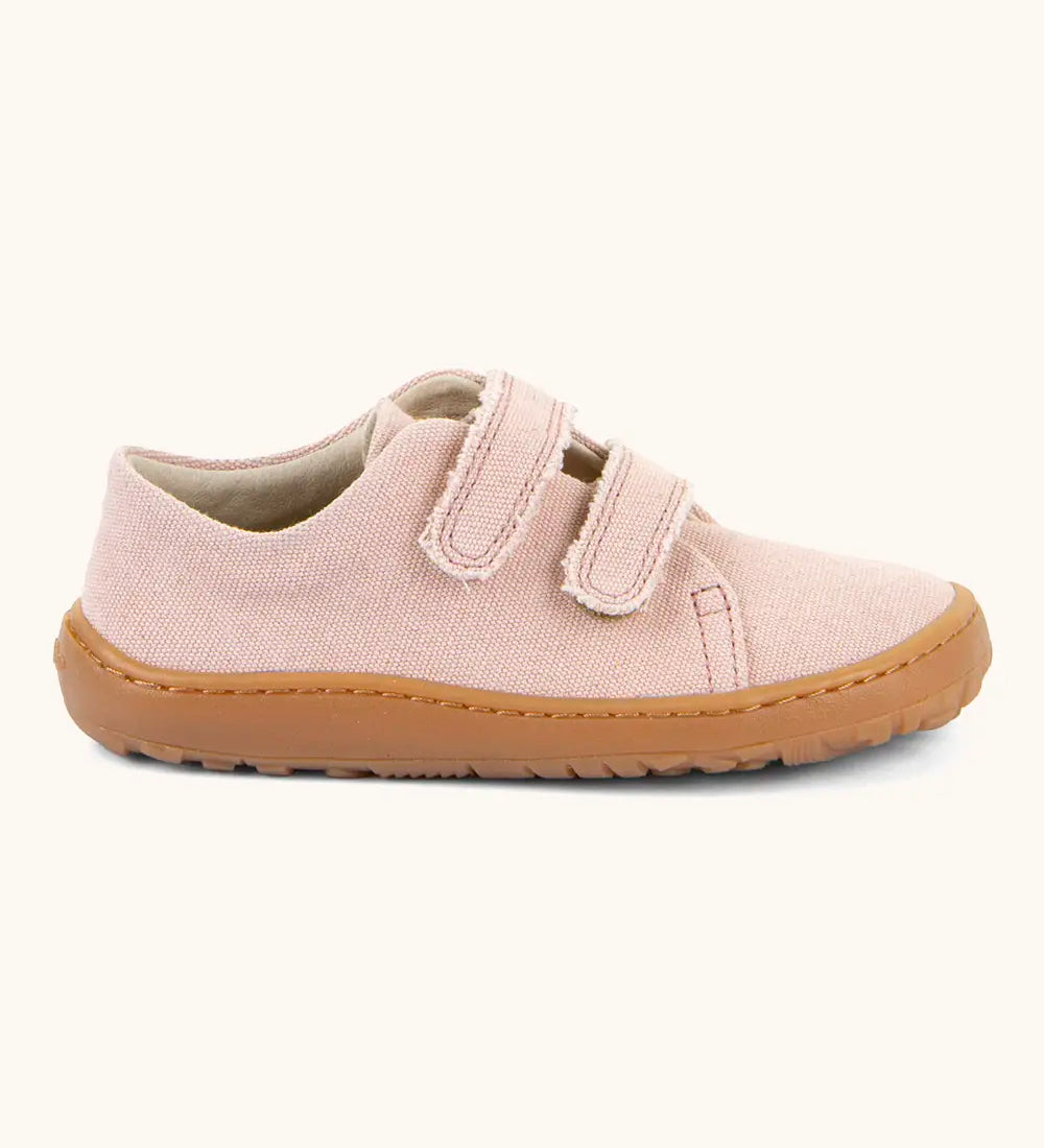Froddo barefoot botaniq kids canvas stye shoes in pale pink shows velcro straps a brown grippy sole