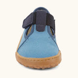 Front of Froddo barefoot canvas style kids shoes in light blue showing dark t-bar velcro lopped through the eyelet 