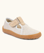 Froddo barefoot canvas style kids shoes in pale cream with a t-bar velcro fastener and brown rubber sole