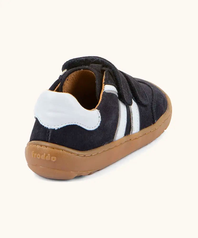 Back of Froddo barefoot f-motion kids shoes in dark blue with white stripe design showing white padded ankle support