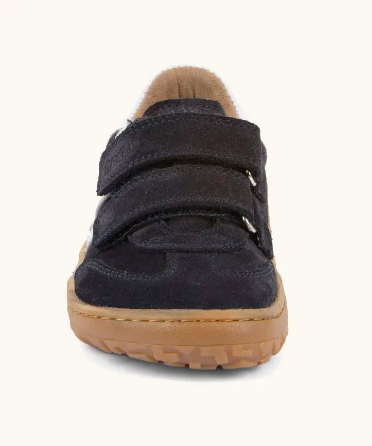 Front of the Froddo barefoot f-motion children's shoe in dark blue showing the 2 velcro fasteners and the brown grippy sole