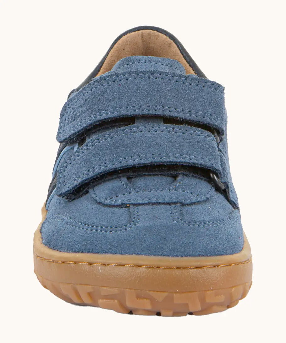 Front of Froddo barefoot f-motion kids suede shoes in denim blue with 2 velcro fasteners, flexible rubber sole. Trainer has wide foot-shaped toe box