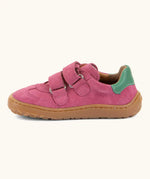 Side of Froddo barefoot f-motion kids shoes in bright pink showing 2 velcro fasteners looped through the eyelets