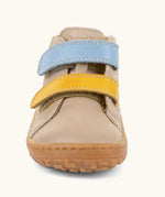 Front of the Froddo barefoot first step baby shoe in beige showing the 2 velcro fastener in blue and yellow