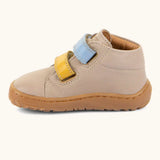 Side of the Froddo barefoot first step baby shoe in beige showing 2 velcro fasteners 
