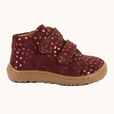 Side of Froddo's maroon natural leather barefoot first step kids shoes. Boot has a flexible rubber sole zero-drop profile