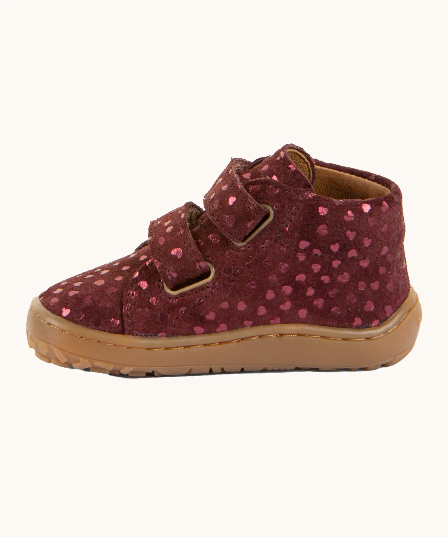 Side of Froddo's maroon natural leather barefoot first step kids shoes showing the padded ankle support. Boot has a flexible rubber sole zero-drop profile
