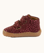 Side of Froddo's maroon natural leather barefoot first step kids shoes showing the padded ankle support. Boot has a flexible rubber sole zero-drop profile