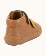 Back of Froddo's light brown natural leather barefoot first step kids shoes showing the padded ankle support. Boot has a zero drop profile