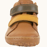 Front of Froddo light brown natural leather barefoot first step kids shoes showing the olive and mustard straps. Boot has a wide toe box shape