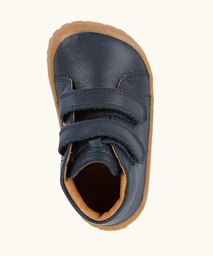 Top view of Froddo barefoot first step baby shoe in dark blue showing the 2 velcro fasteners and inner sole detail