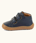 Side of the Froddo barefoot first step baby shoe in dark blue a showing 2 velcro fasteners