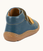 Back of Froddo's denim blue natural leather barefoot first step kids shoes showing the padded ankle support. Boot has a zero drop profile