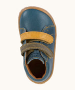 Top view of Froddo's denim blue natural leather barefoot first step kids shoes showing the olive and mustard straps. Boot has a wide toe box shape