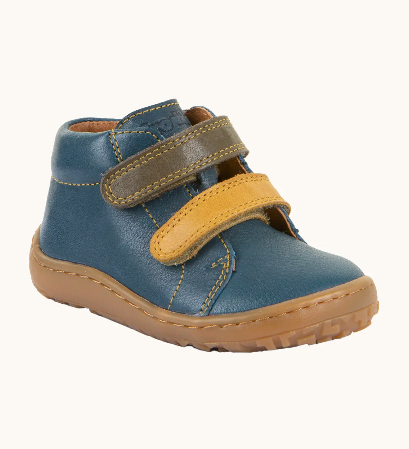 Denim blue Froddo soft natural leather barefoot first step kids shoes with olive and mustard straps, flexible rubber sole zero-drop profile, and a wide toe box