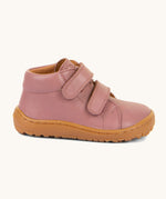 A side image of the Froddo barefoot first step kids shoes in dusty pink available at Babipur showing the 2 velcro strap fasteners and the light brown grippy sole