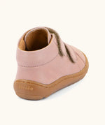 Back of the Froddo barefoot first step baby shoe in pale pink showing a padded ankle support and grippy sole 