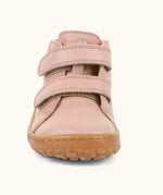 Front of the Froddo barefoot first step baby shoe in pale pink showing the 2 velcro fastener