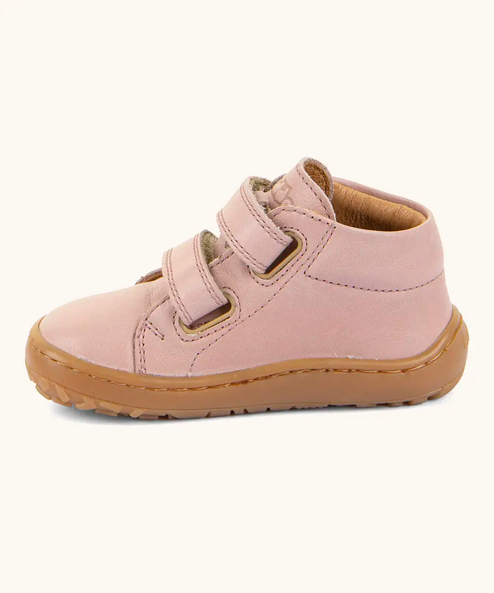 Side of the Froddo barefoot first step baby shoe in pale pink a showing 2 velcro fasteners