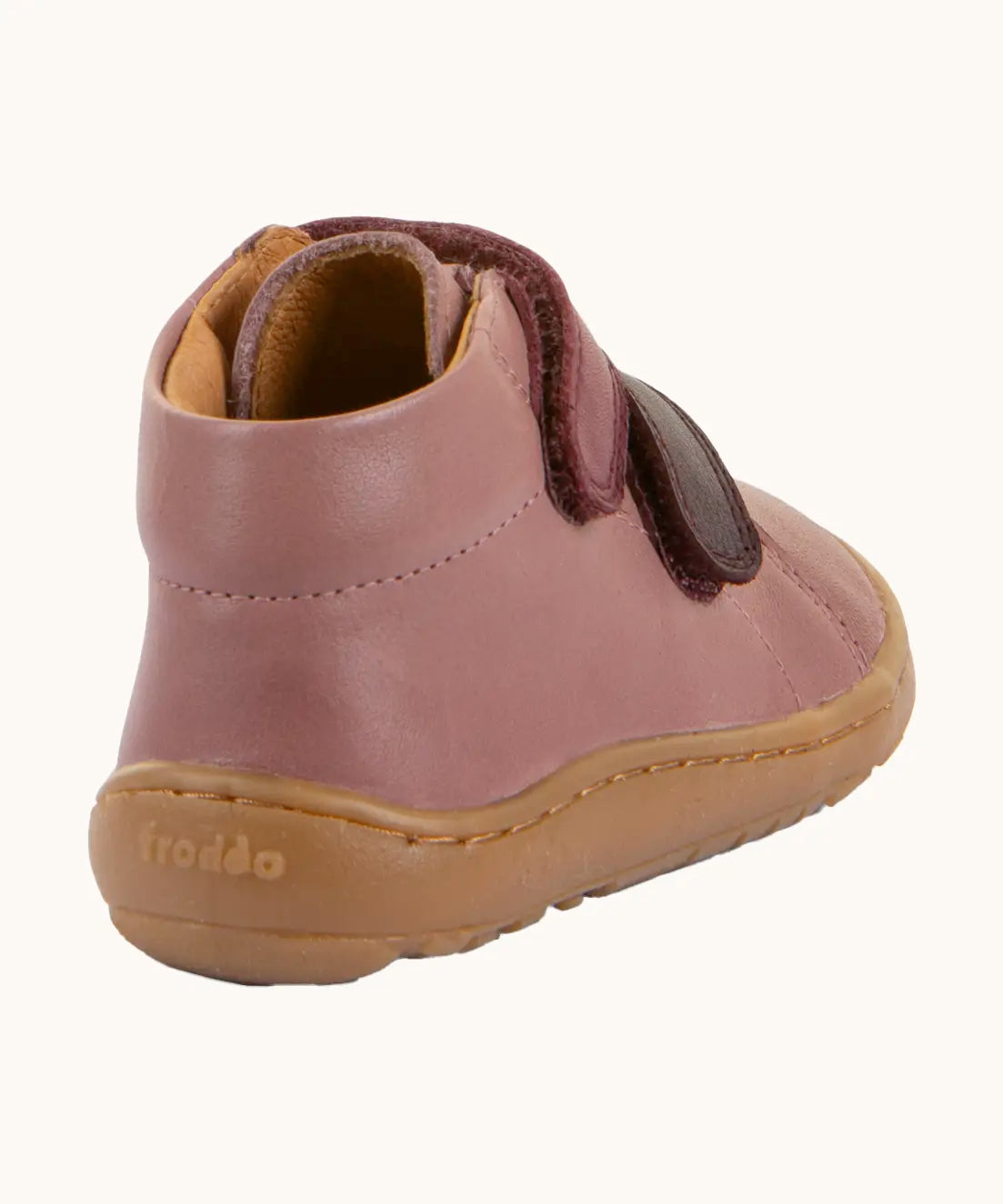 Back of Froddo's rosy pink natural leather barefoot first step kids shoes showing the padded ankle support. Boot has a zero drop profile