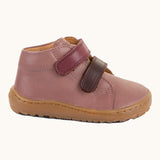 Side of Froddo's rosy pink natural leather barefoot first step kids shoes showing the purple straps. Boot has a flexible rubber sole zero-drop profile