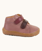 Side of Froddo's rosy pink natural leather barefoot first step kids shoes showing the purple straps. Boot has a flexible rubber sole zero-drop profile