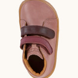 Top view of Froddo's rosy pink natural leather barefoot first step kids shoes showing the purple straps fastened. Boot has a wide toe box shape
