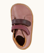 Top view of Froddo's rosy pink natural leather barefoot first step kids shoes showing the purple straps fastened. Boot has a wide toe box shape