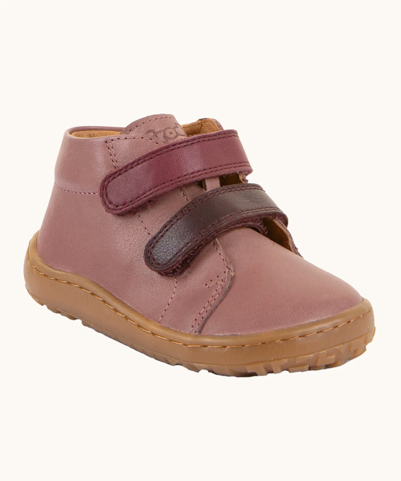 Rosy pink Froddo soft natural leather barefoot first step kids shoes with purple straps, flexible rubber sole zero-drop profile, and a wide toe box